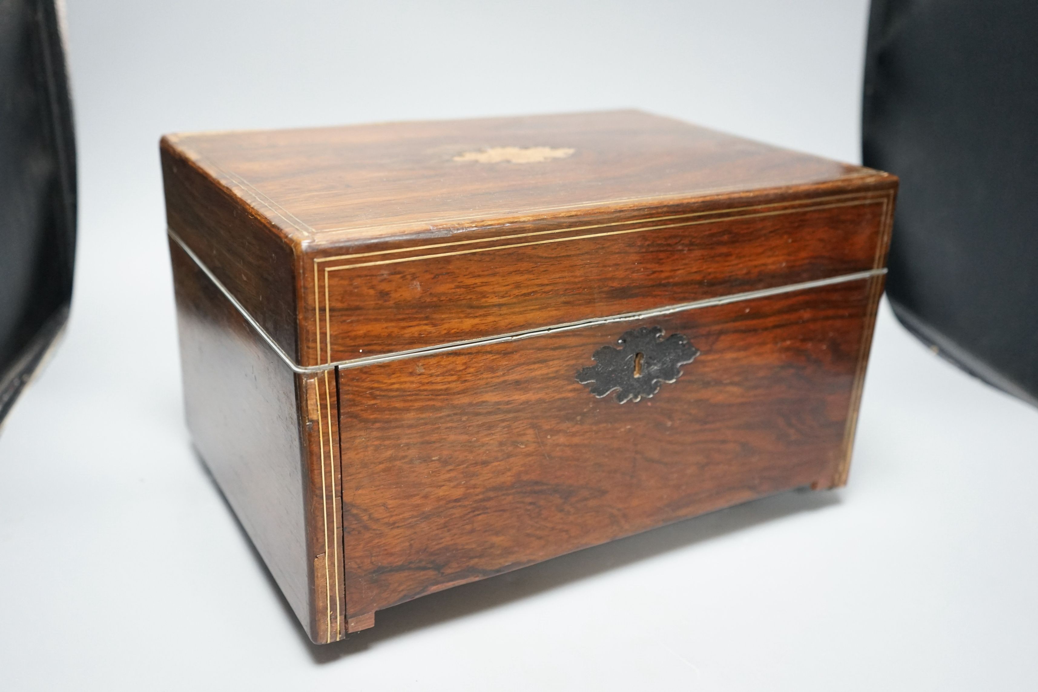 A Victorian rosewood stationery box, with red Morocco interior, by S Woodfield, 21 high x 35cms wide